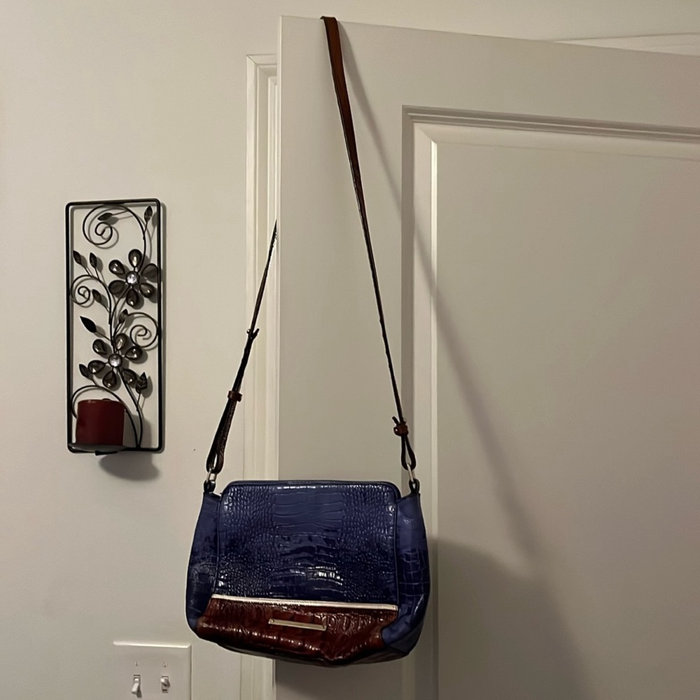 Blue and pecan medium size Brahmin shoulder purse in good condition.